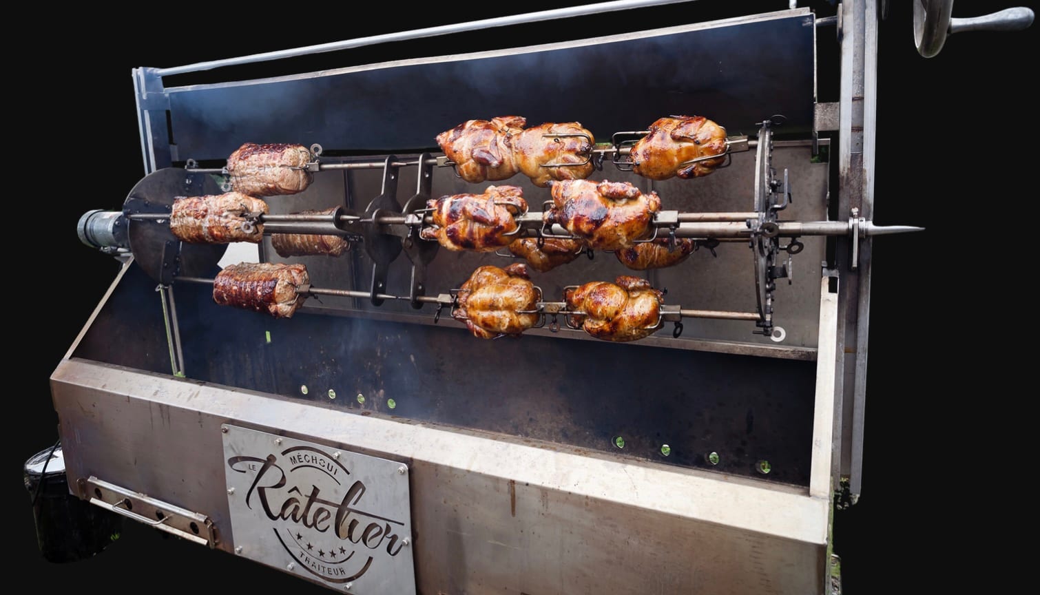 Méchoui rôti sur braise lors d'un événement du Râtelier